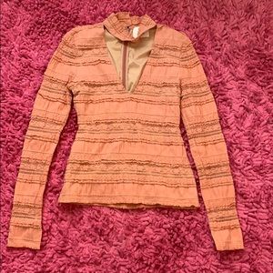 Cute, long sleeved, ruffled top